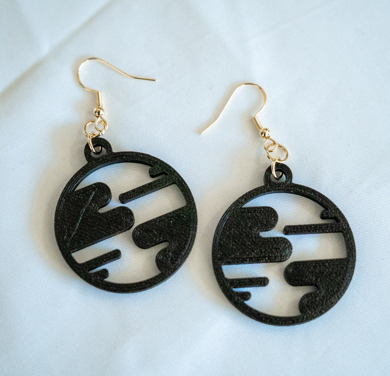 black small world earrings