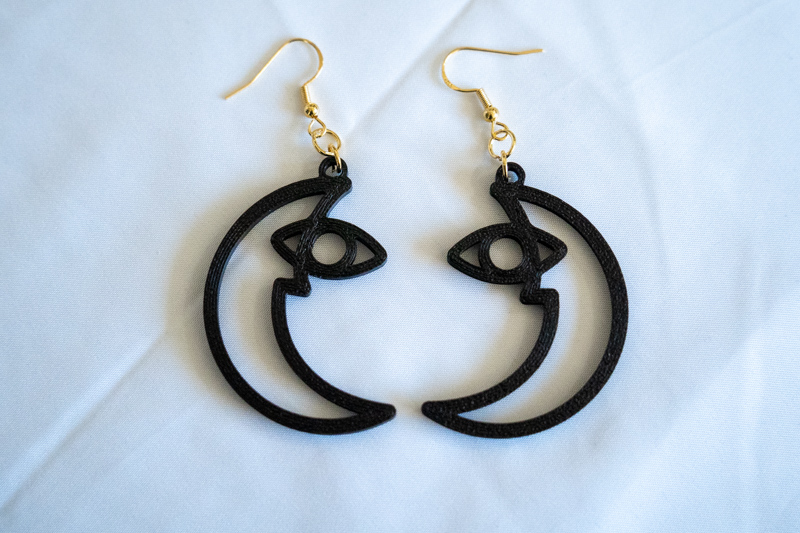 black waxing moon earrings